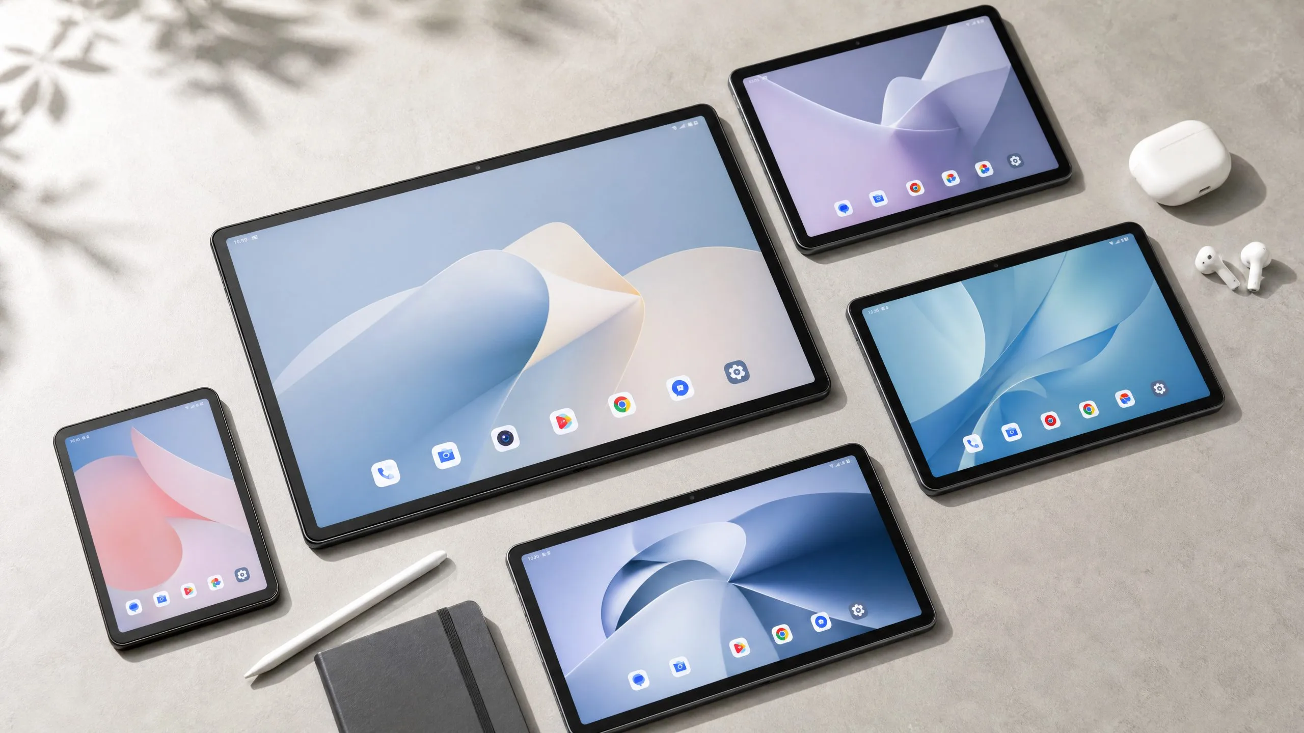 Best tablets with large screens 2026 - five tablets of different sizes arranged on a light gray surface